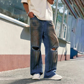 Faded Effect Wide Leg Ripped Jeans