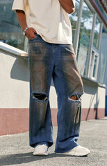 Faded Effect Wide Leg Ripped Jeans